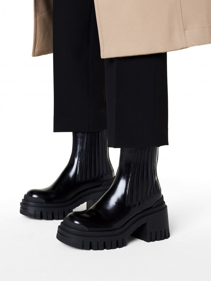 Slip-on boots on a solid sole