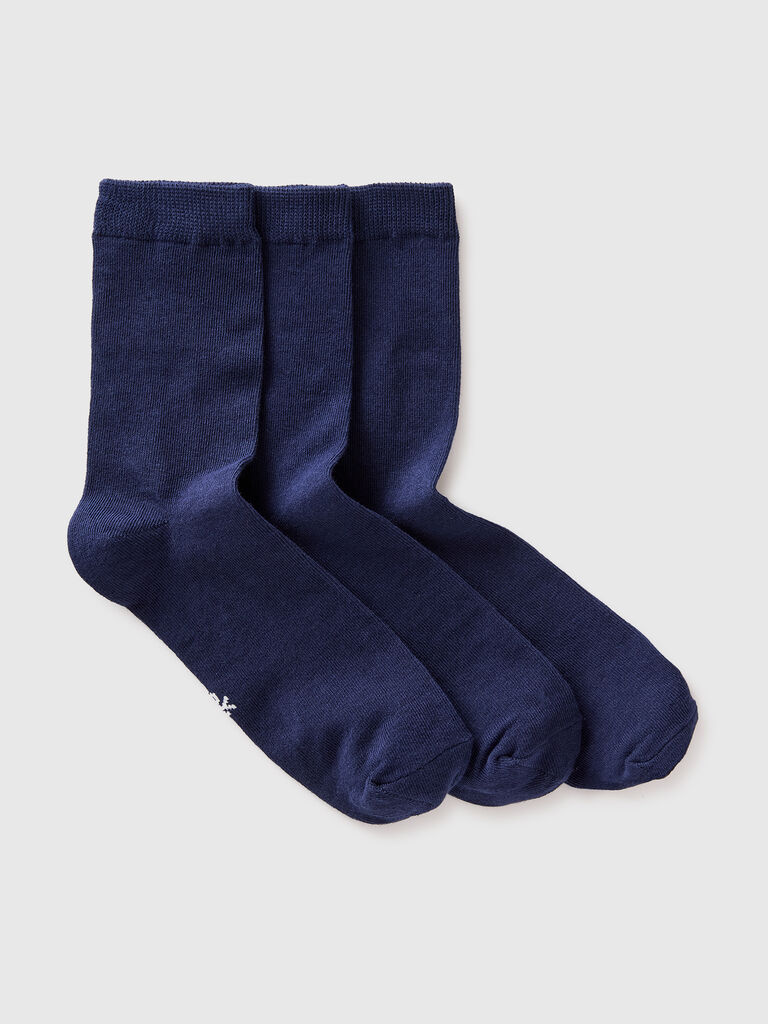 Three pairs of solid-colored medium socks