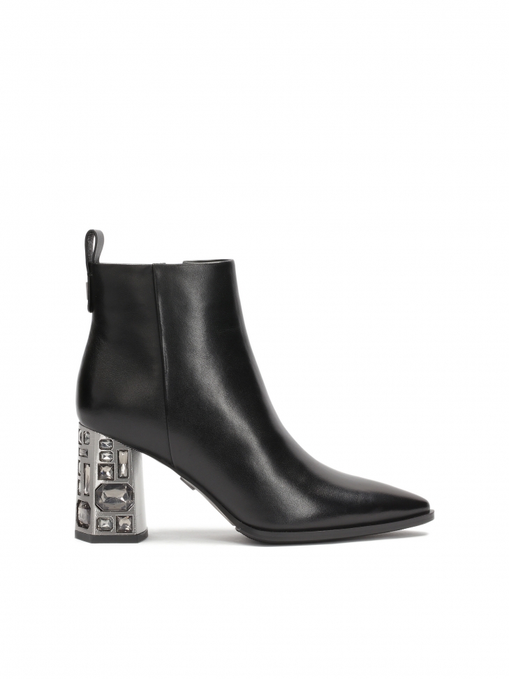 Black boots with decorative heel