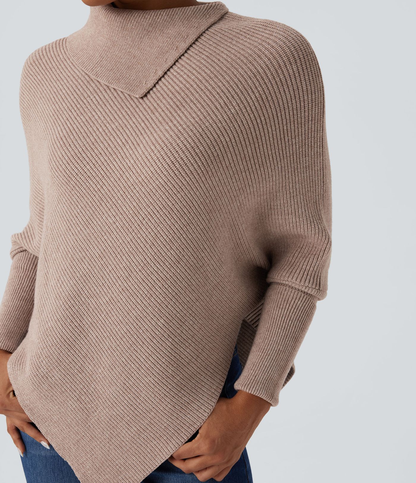 Pull cape décontracté col roulé manches chauve-souris ourlet asymétrique