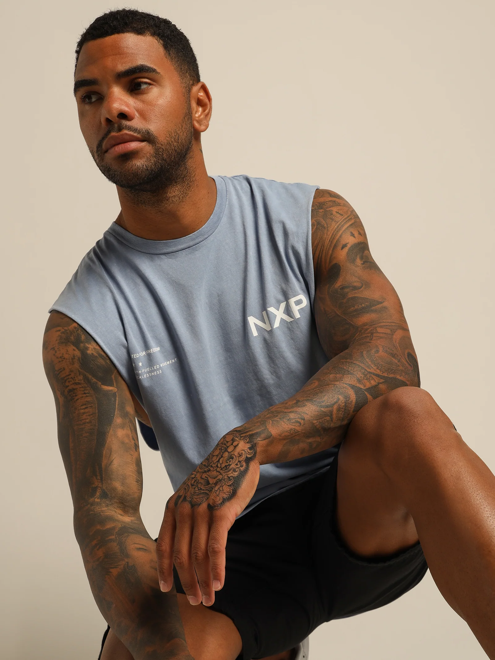 Courageous Scoop Back Muscle Shirt