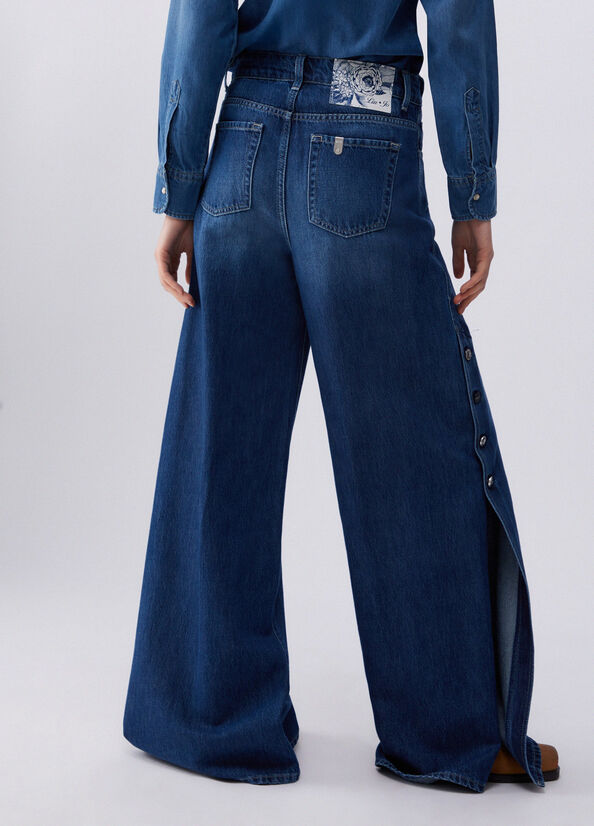 Jeans flare con spacchetti