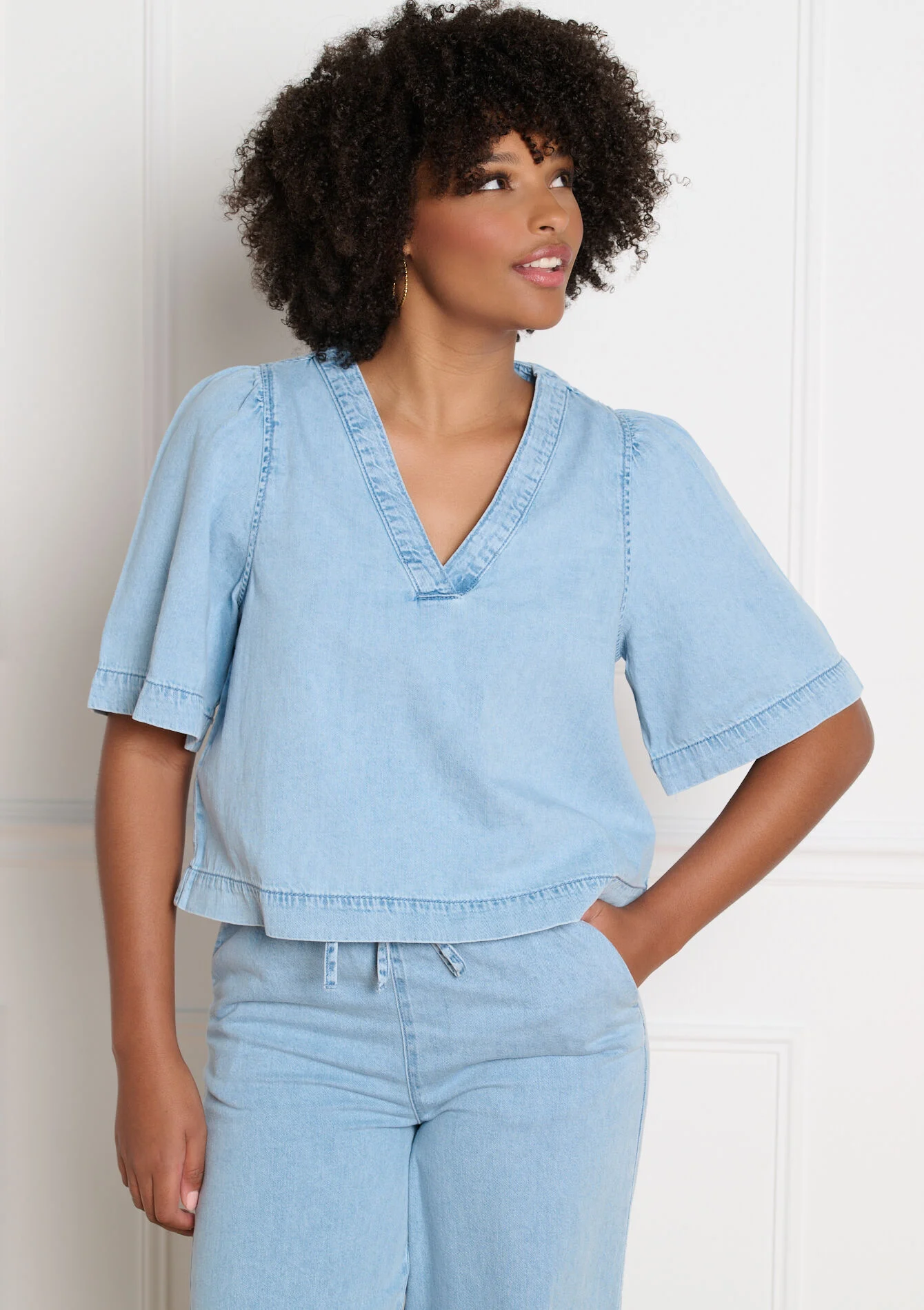 Denim blouse met v-hals