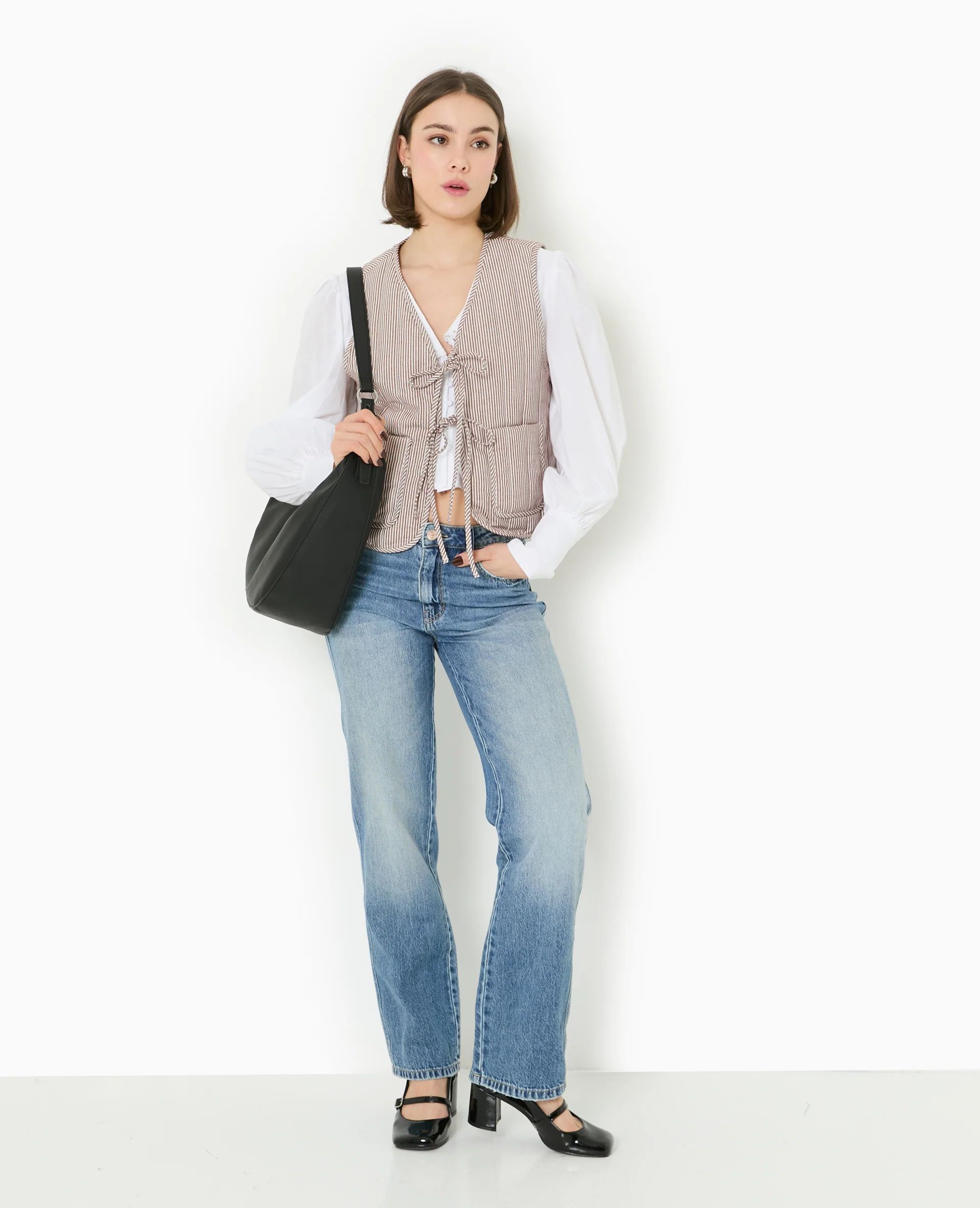 Veste sans manches matelassée avec rayures