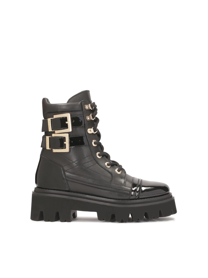Leather boots with patent leather elements