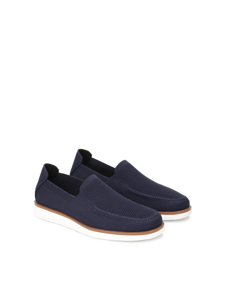 Navy blue slip on shoes in stretch fabric