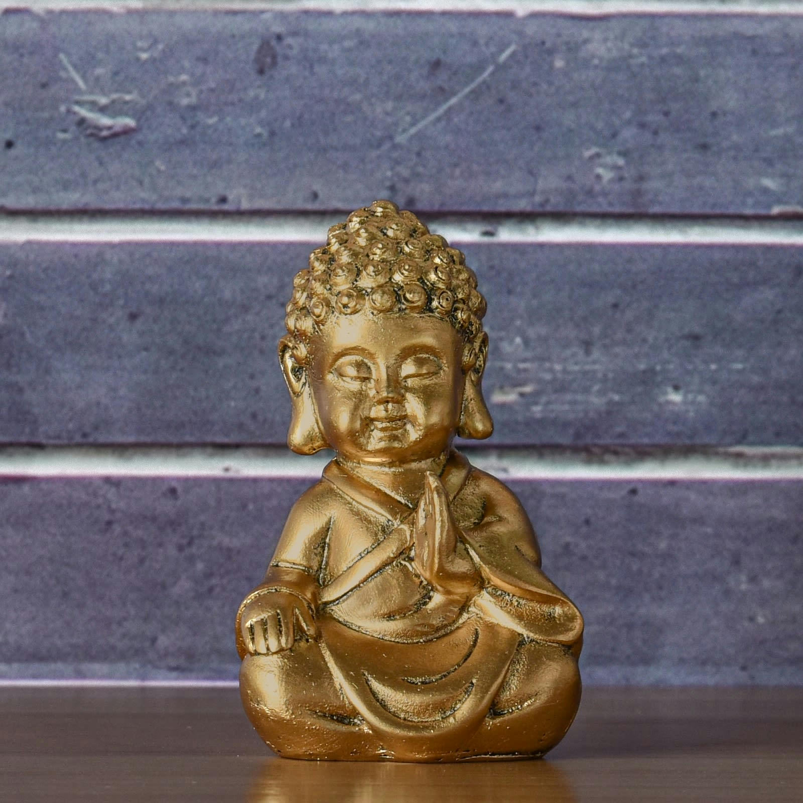 BOUDDHA - Statuette décoration à poser Bouddha baby zen en résine doré - H11 cm