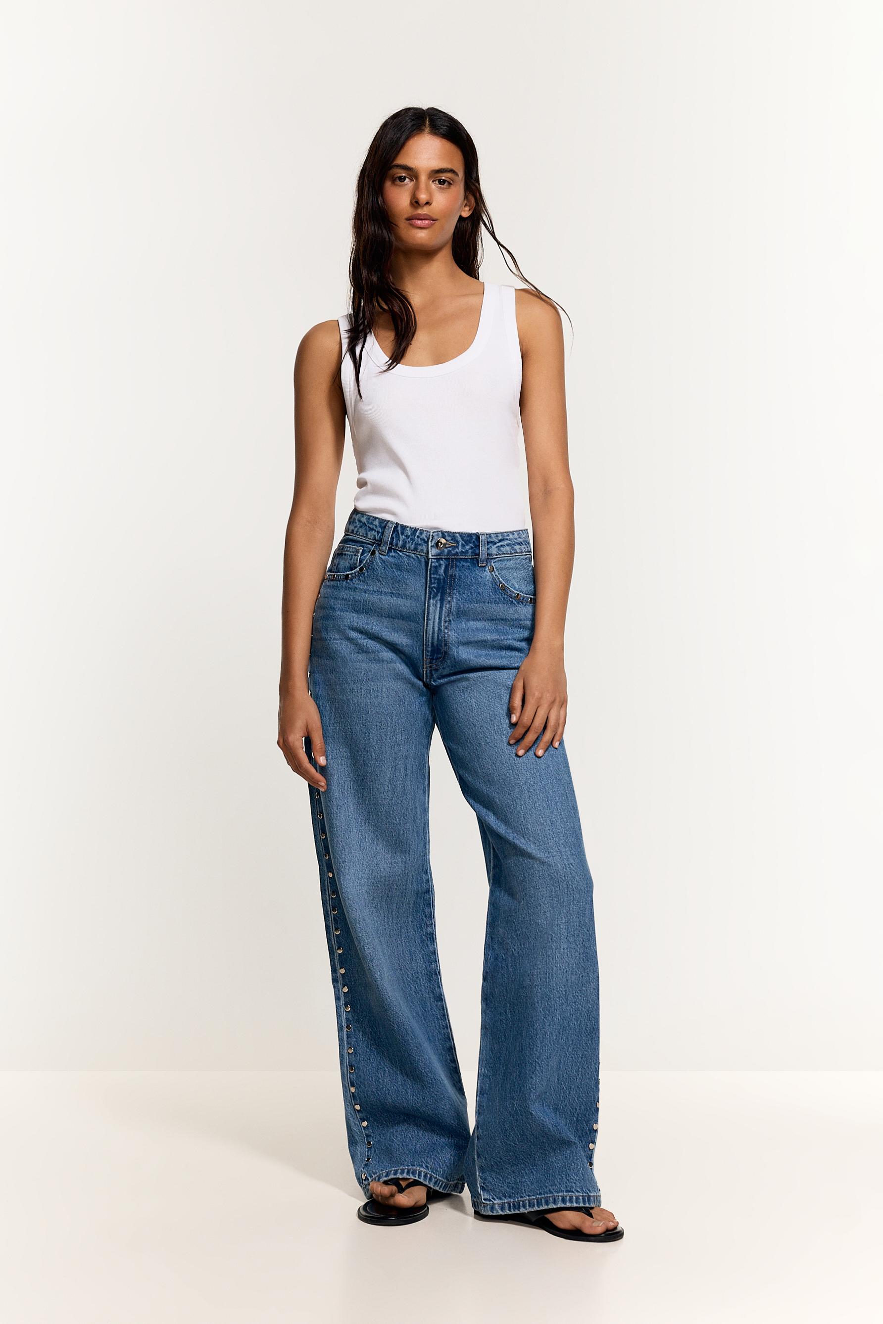 Jeans wide leg tachas
