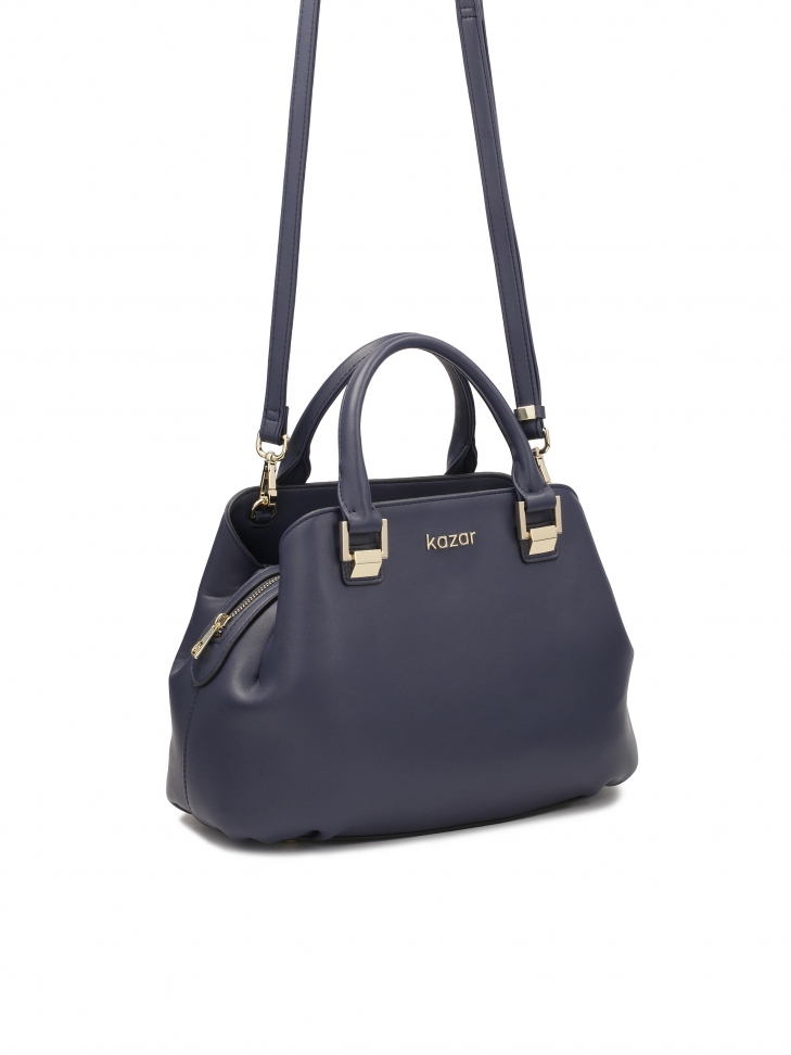 Navy blue leather handbag with hand grips