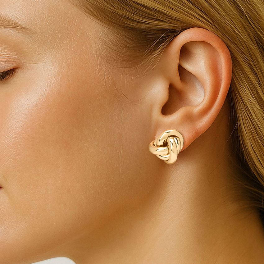 Manfield Goudkleurige knot oorbellen