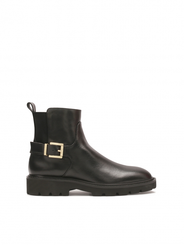 Classic leather boots on a flat sole