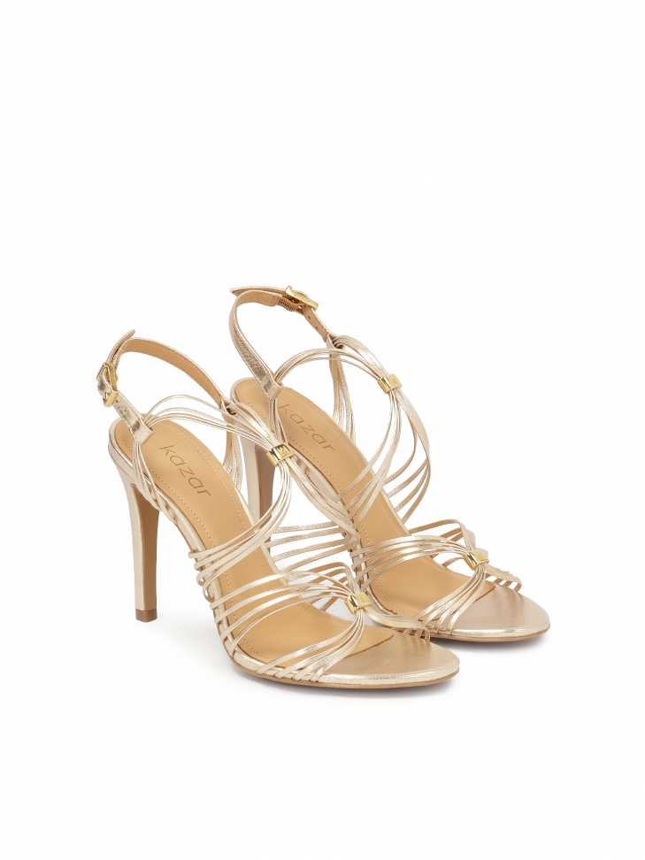 Gold stiletto sandals with thin straps