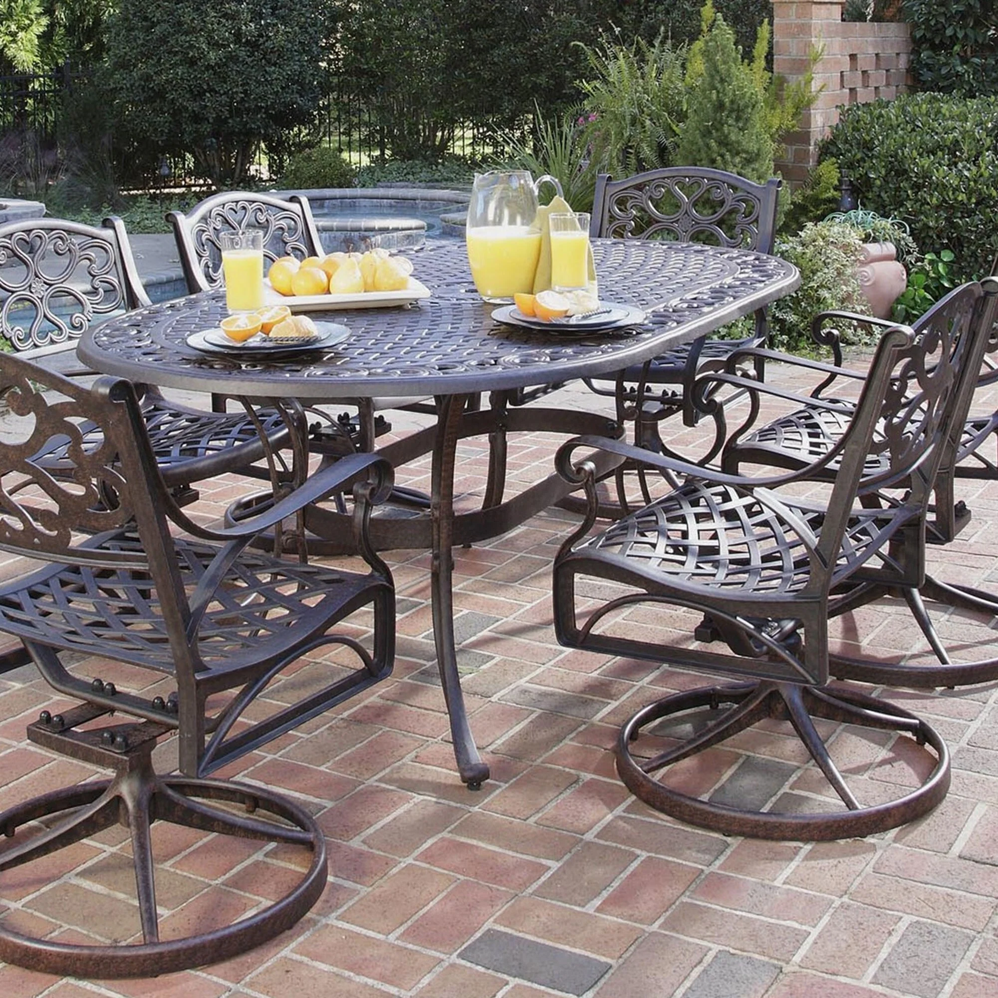 Sanibel Cast Aluminum 7-Piece Outdoor Dining Set with an Oval Table and 6 Swivel Chairs by Homestyles