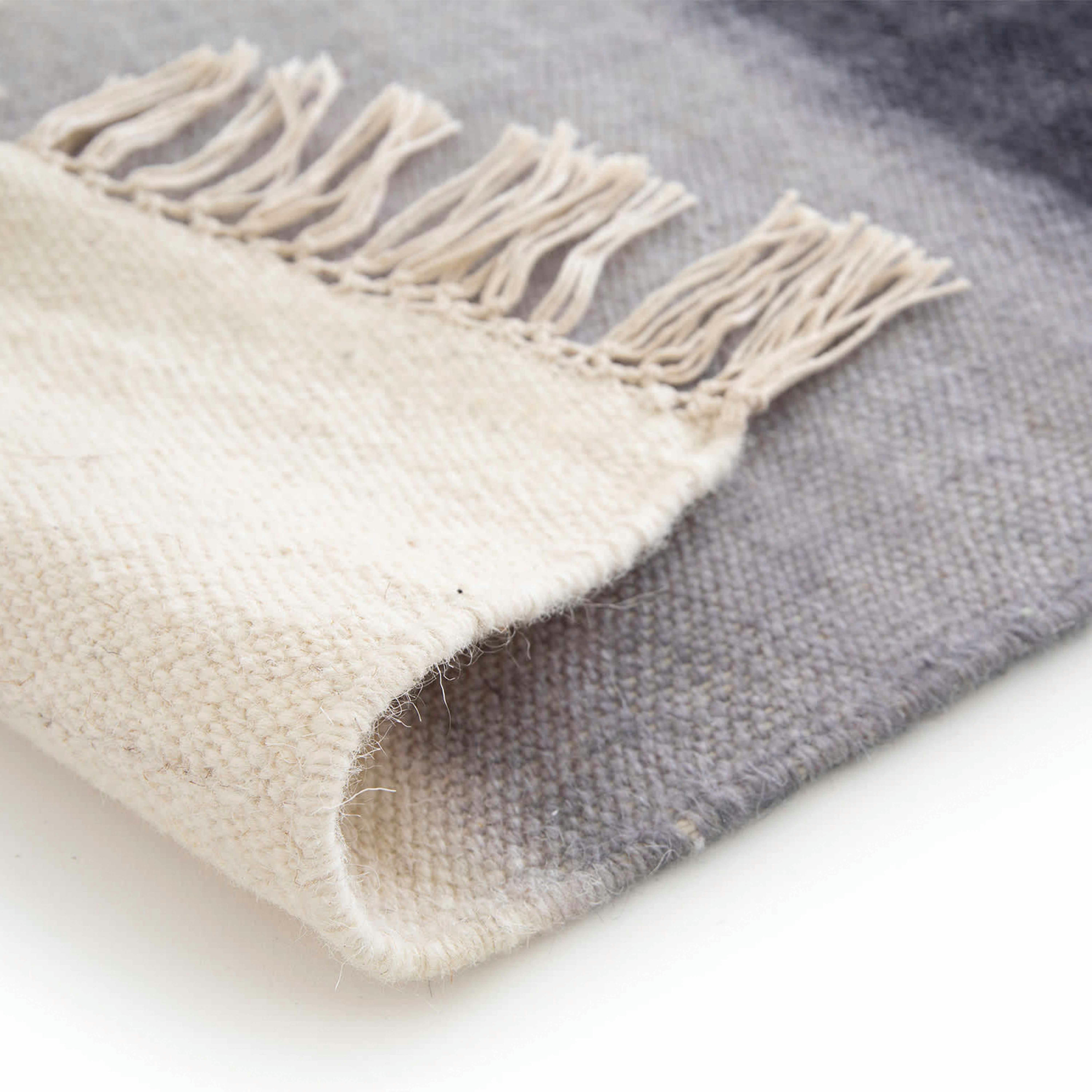 DUNA - Tapis rectangulaire en laine tissé à plat bleu 120 x 170 cm