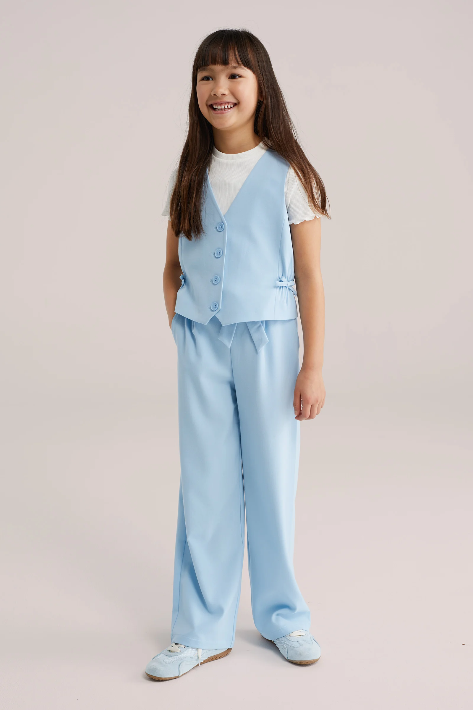 Meisjes gilet met strikdetails