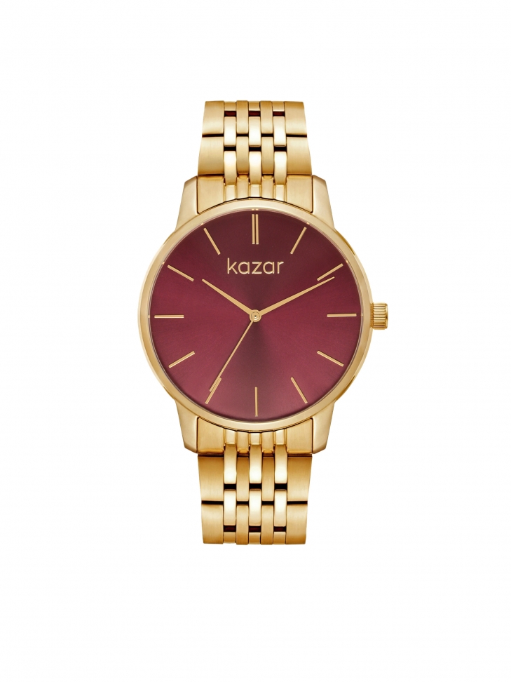 Gold watch with maroon dial
