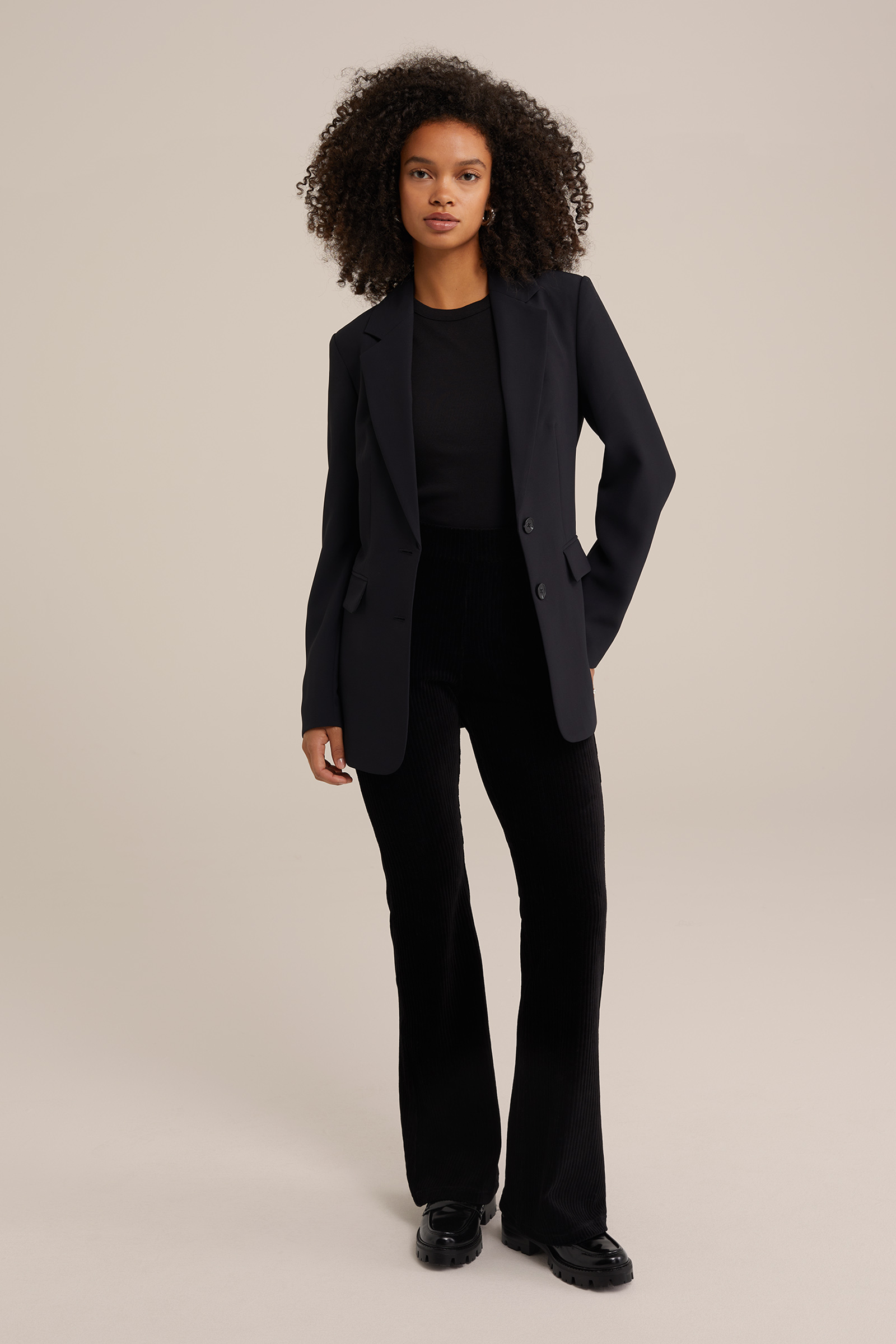 Dames flared legging van ribstof