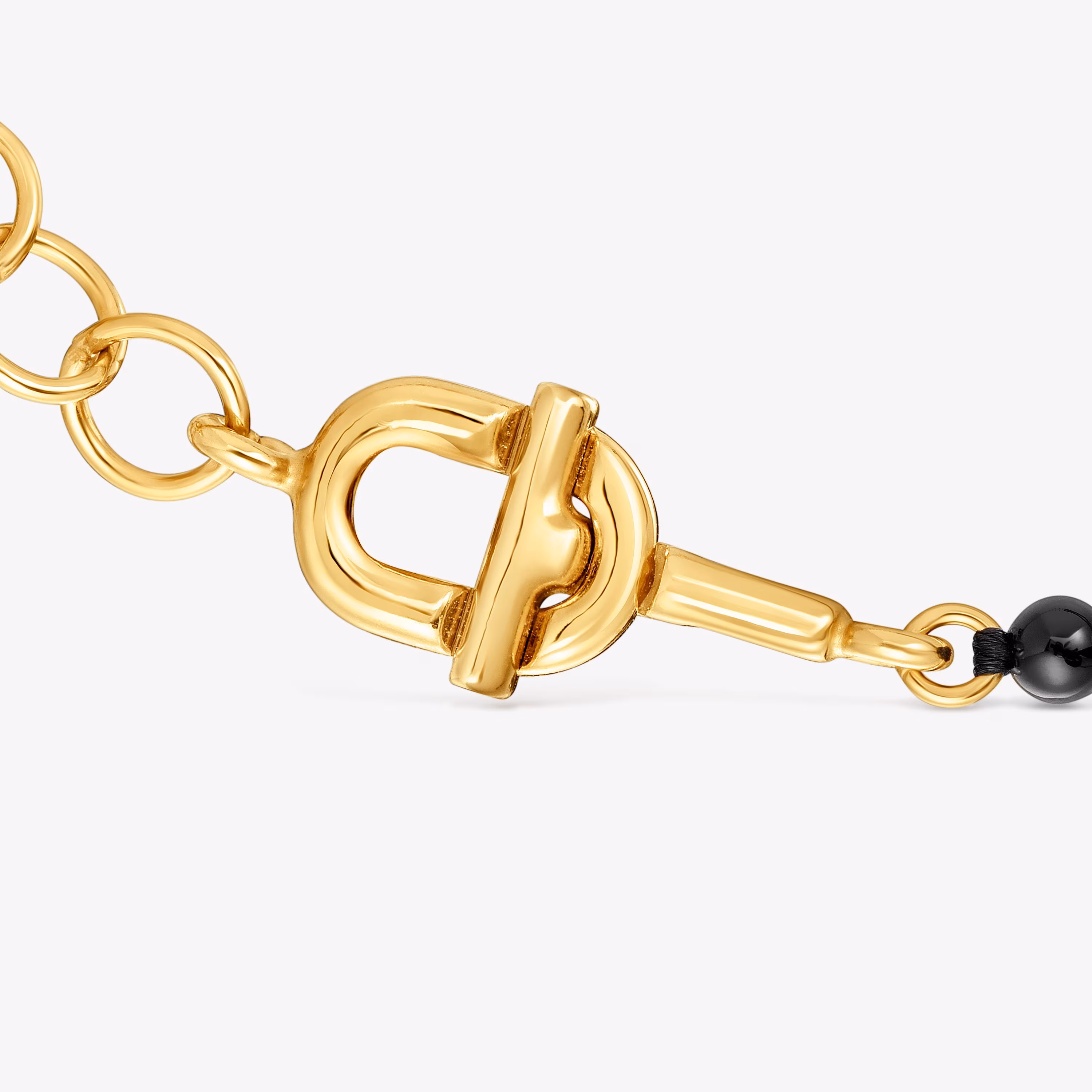 Pulsera cadena con baño de oro 18 kt sobre plata y ónix TOUS MANIFESTO