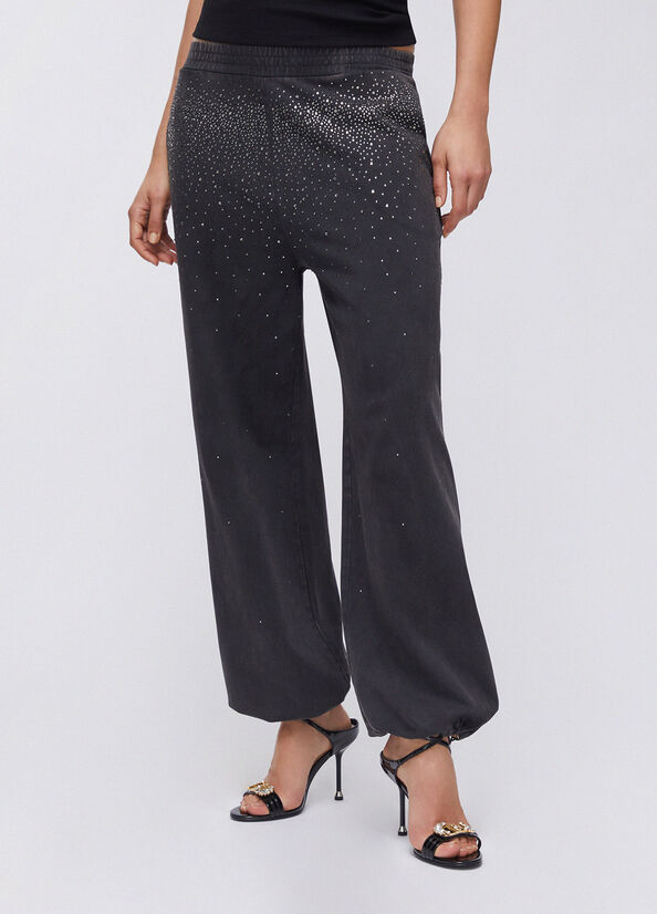 Pantalone in jersey d&eacute;lav&eacute; con strass