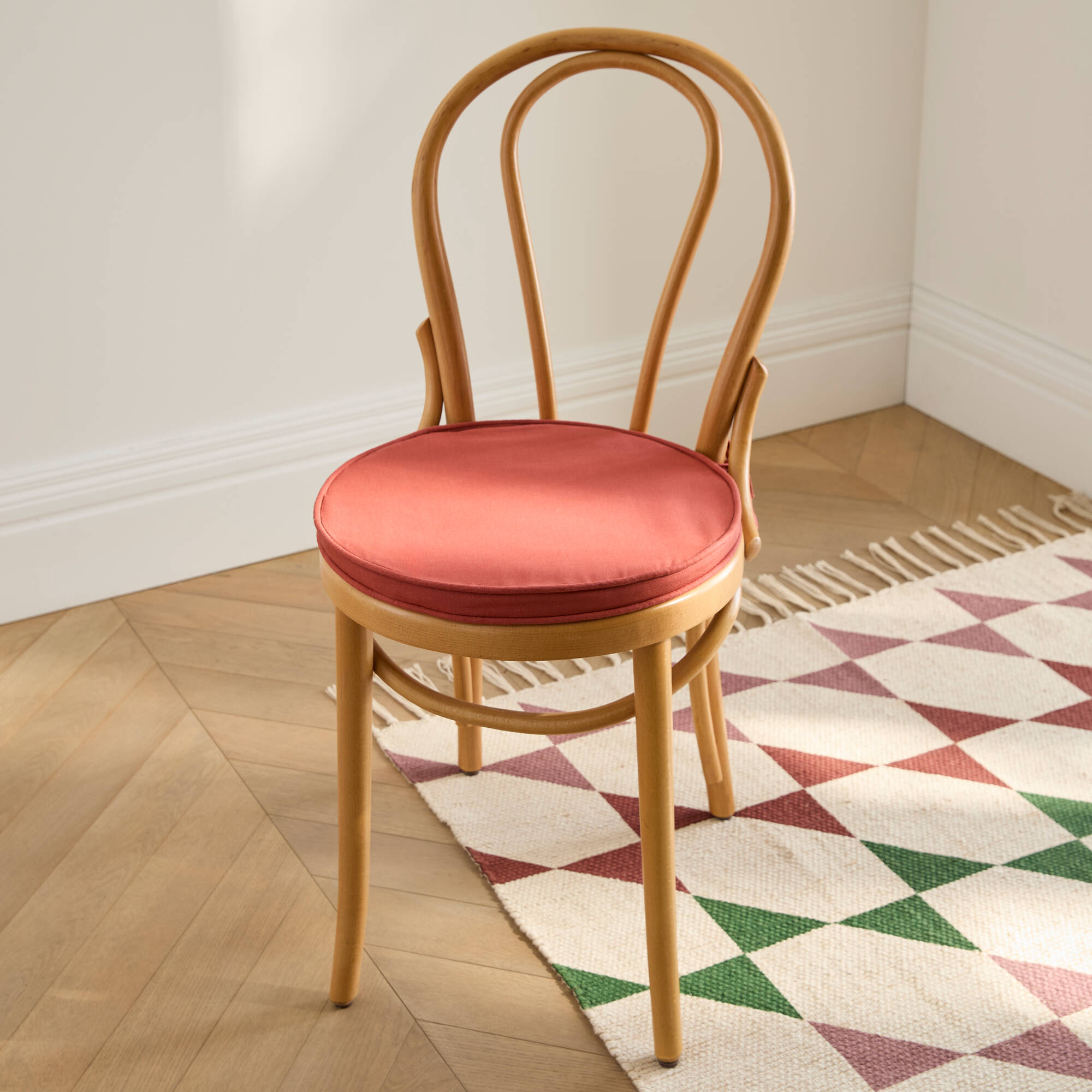 Coussin d'assise uni rond bachette