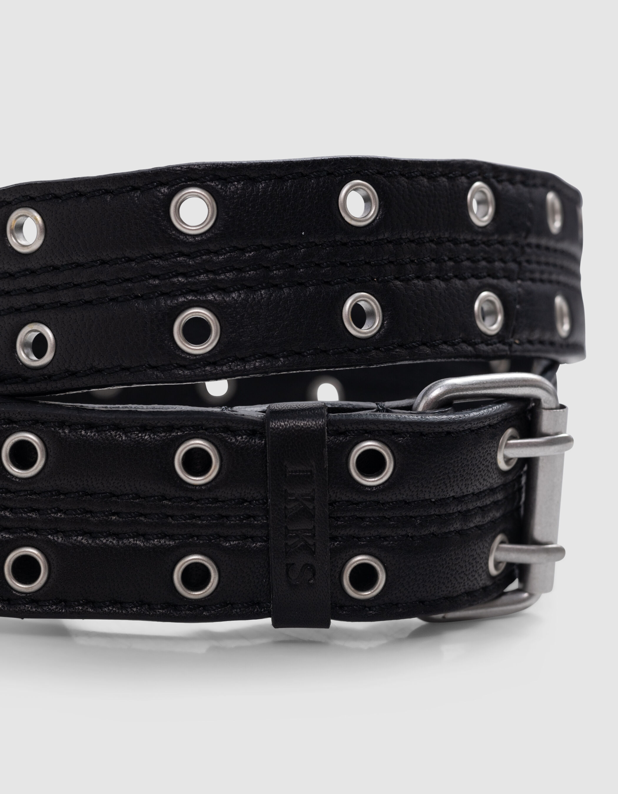 Ceinture noire cuir décor double œillets Femme