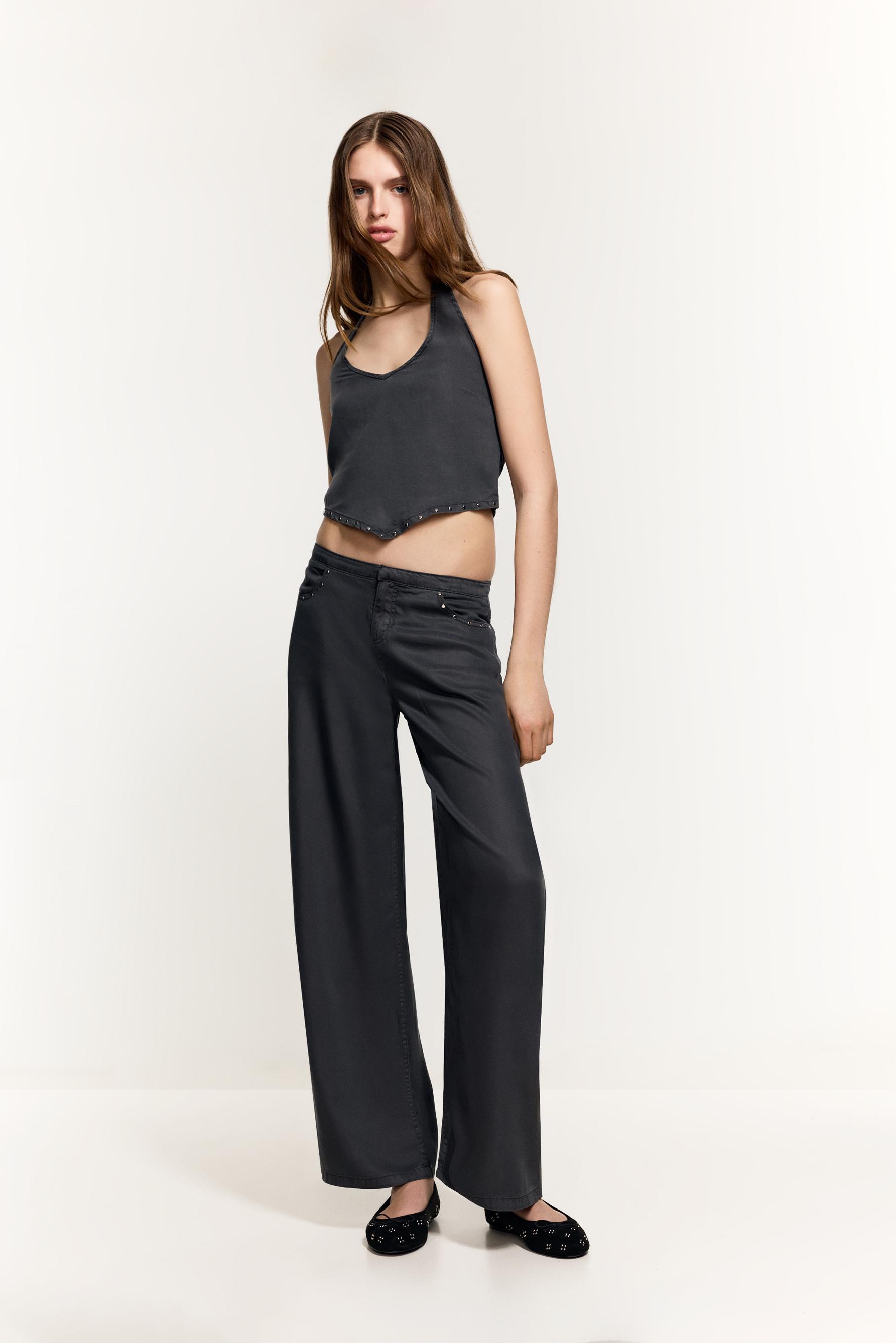 Pantalón tachas
