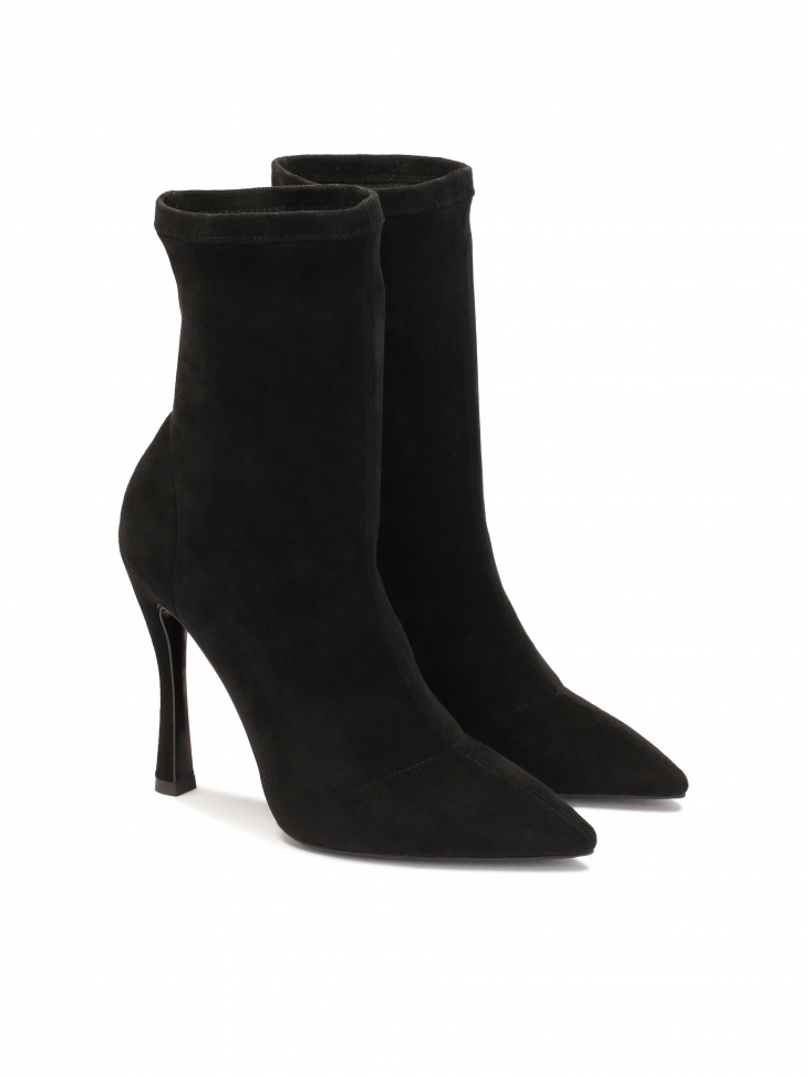 Black fabric boots with a contoured heel