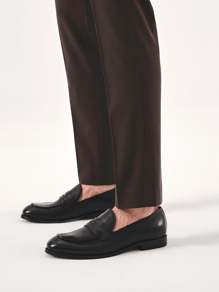 Black leather men's penny loafers