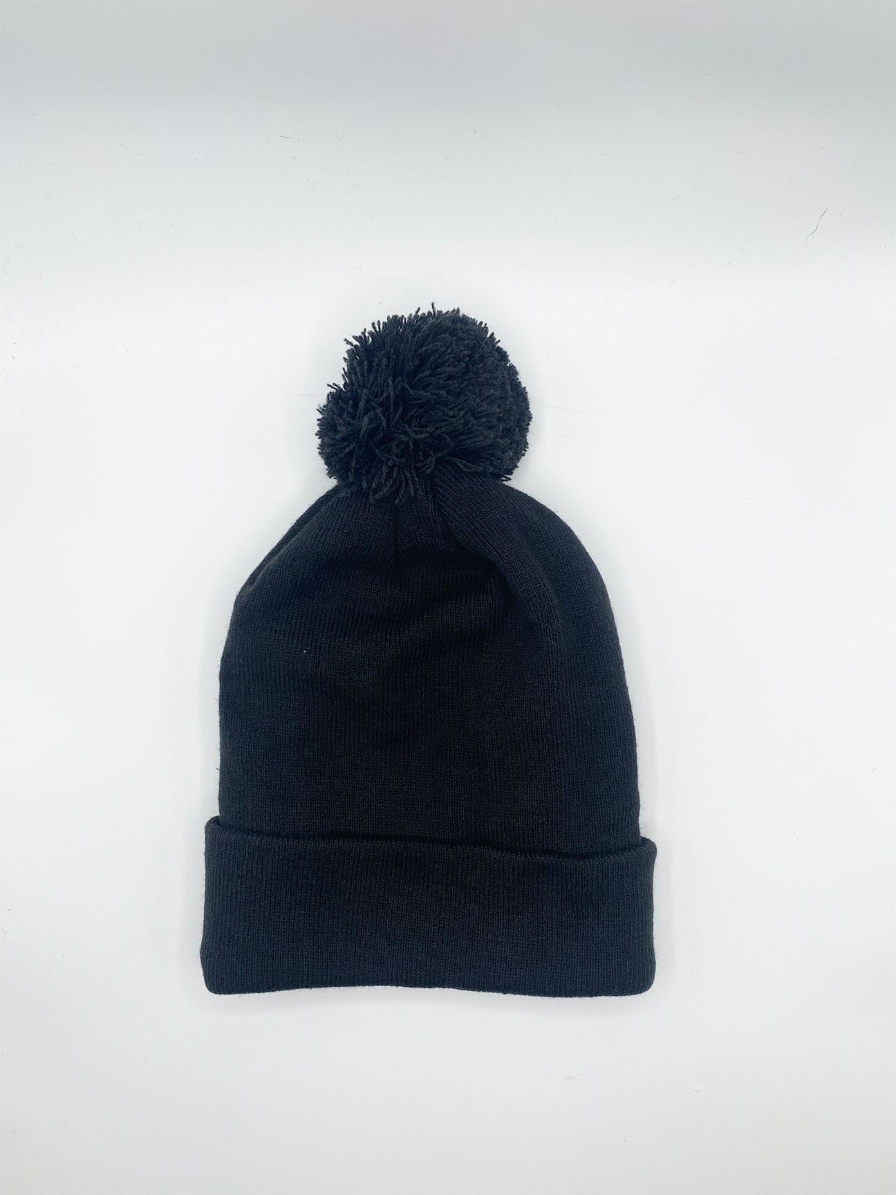 SVNX Knitted Pom Pom Beanie in Black