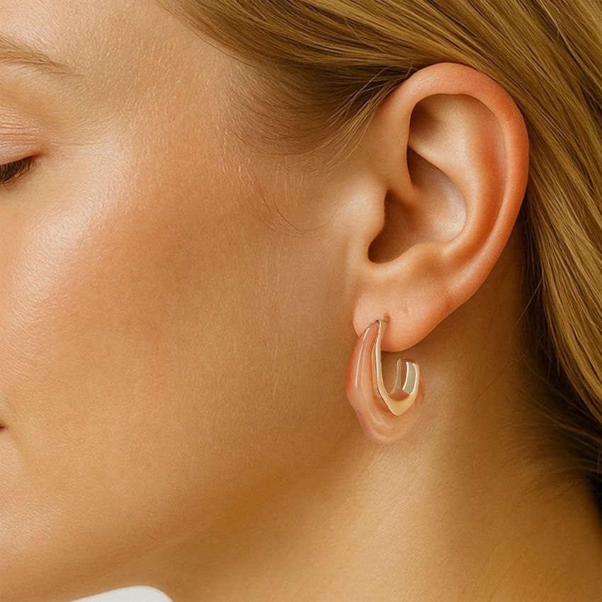 Manfield Licht roze oorbellen met gouden randje