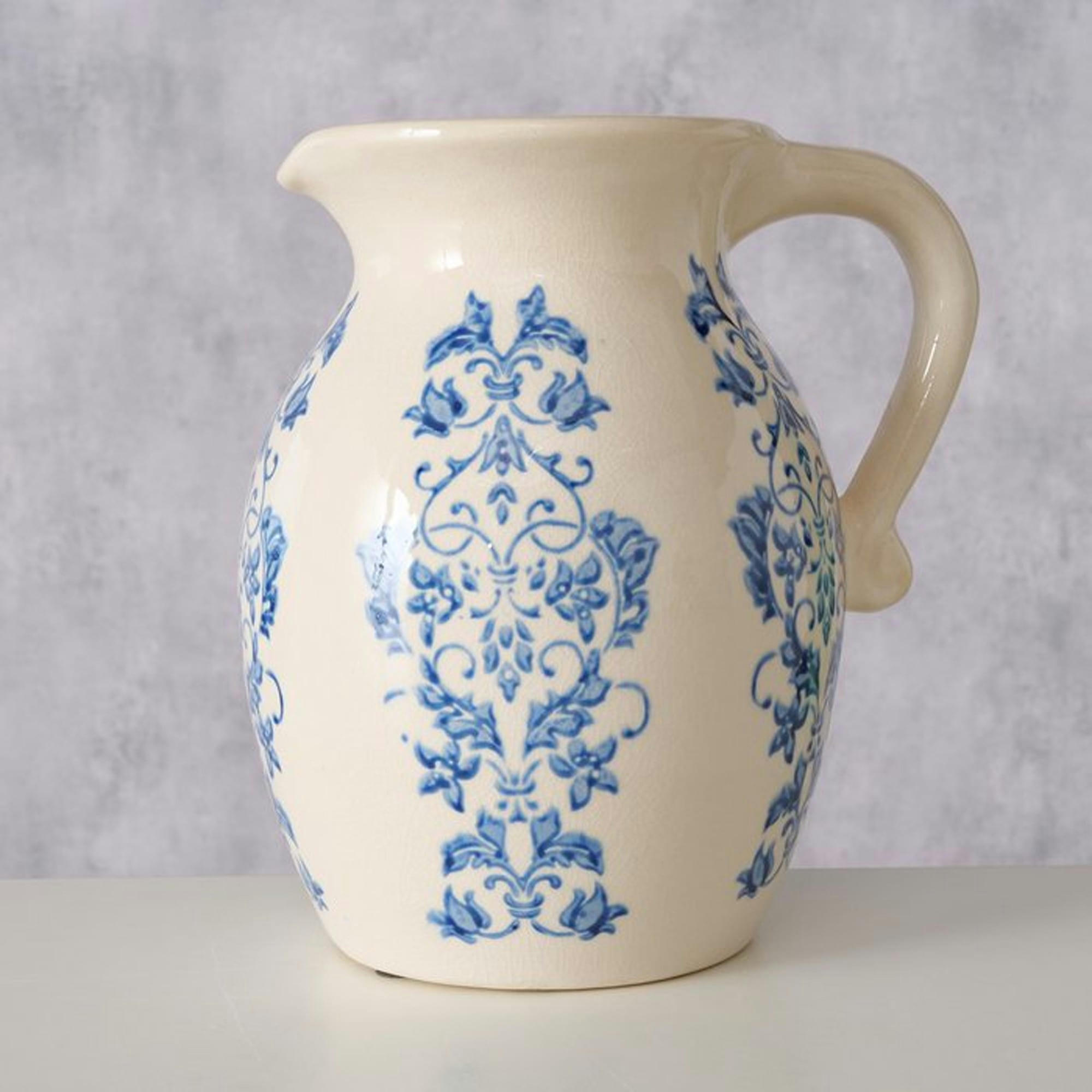 - Vase cruche floral en grès blanc et bleu