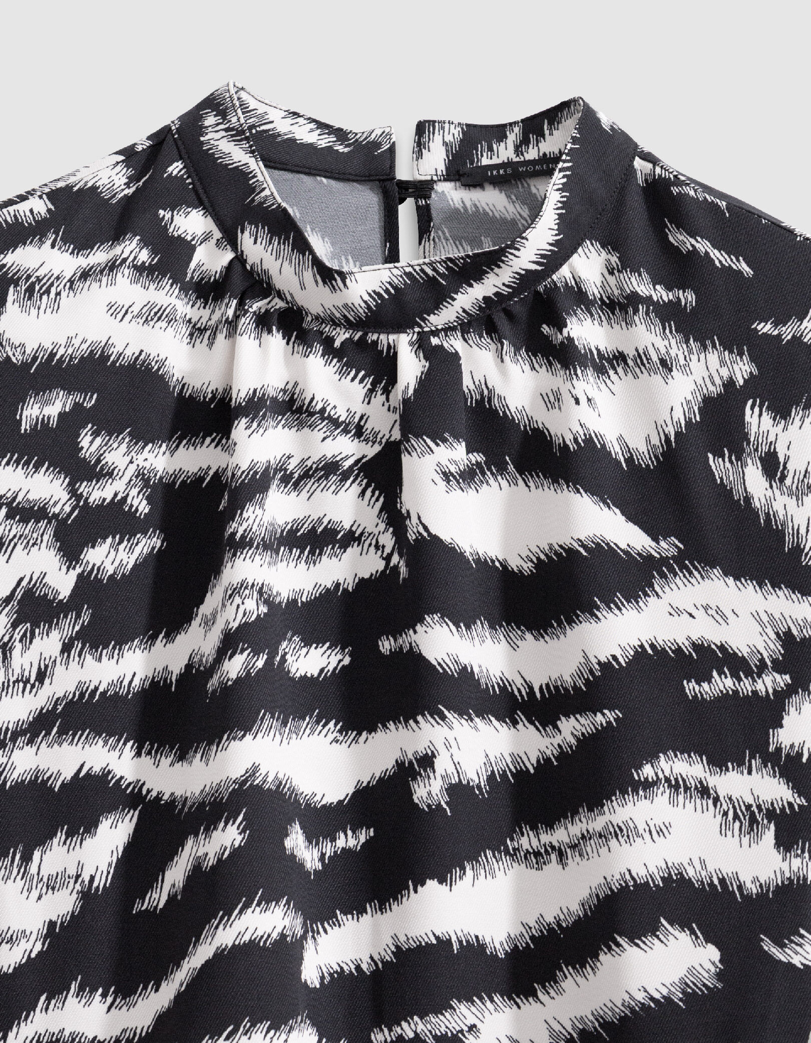 Blouse noire imprimé zèbre Femme