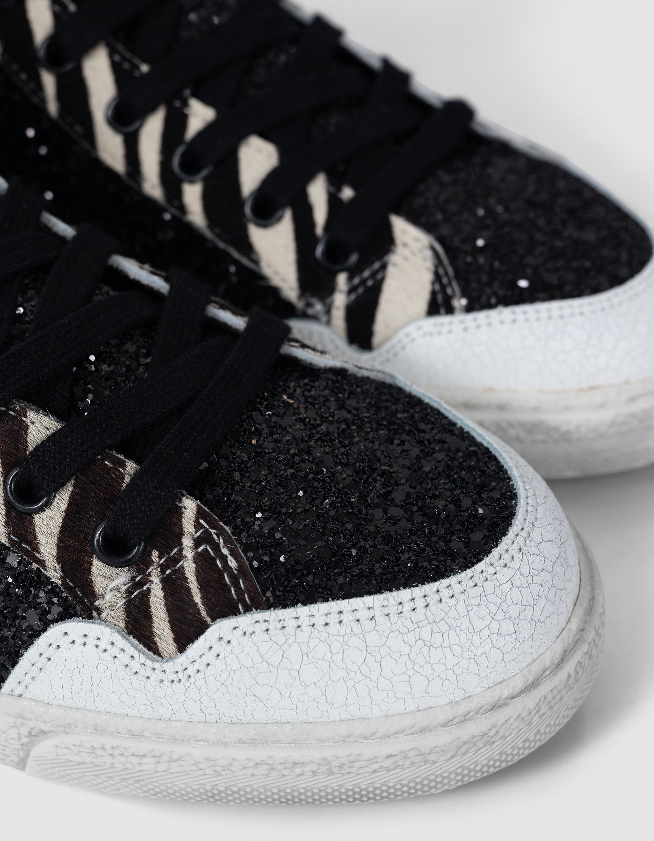 Baskets noires micro sequins et cuir motif zèbre Femme