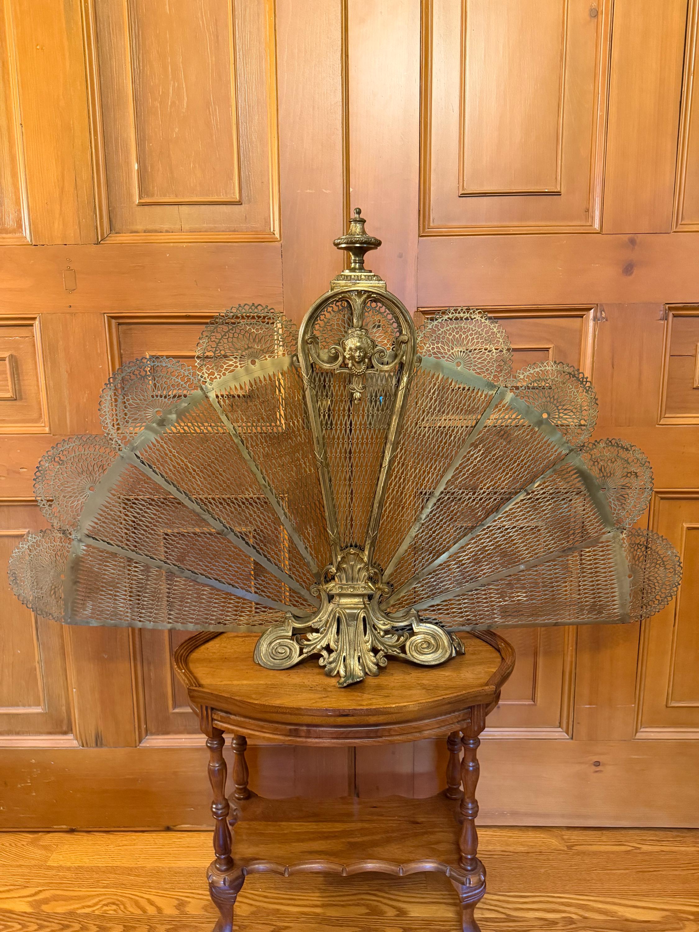 An antique mid 19th century Napolean III era French gilded bronze fireplace screen