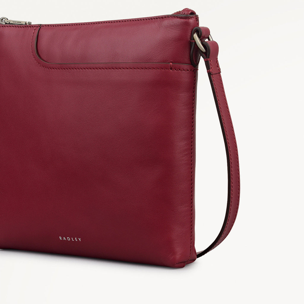 Pockets - Small Ziptop North-South Cross Body Bag