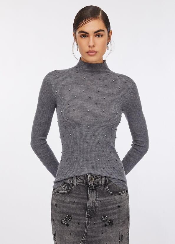 Maglia 100% lana con applicazioni