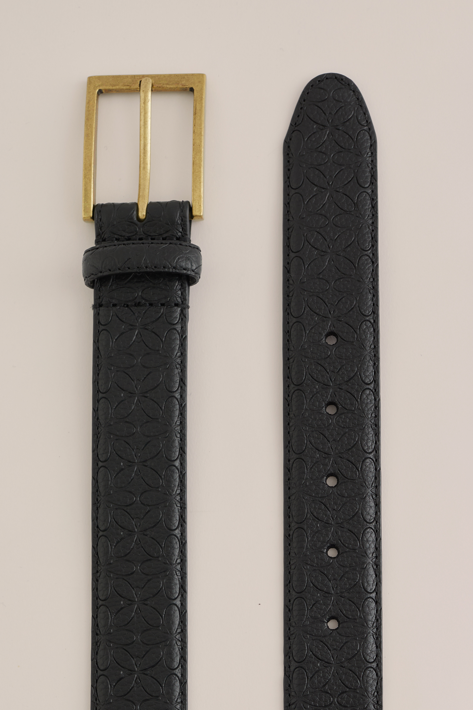 Heren leren riem met bloemenpatroon