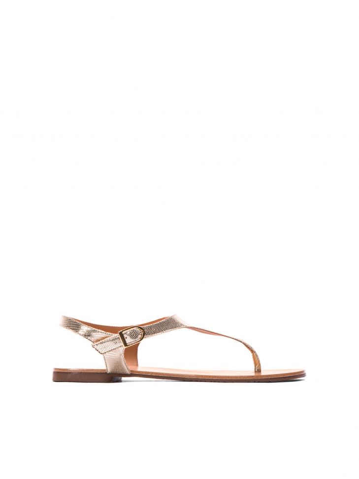 Golden sandals made of embossed leather