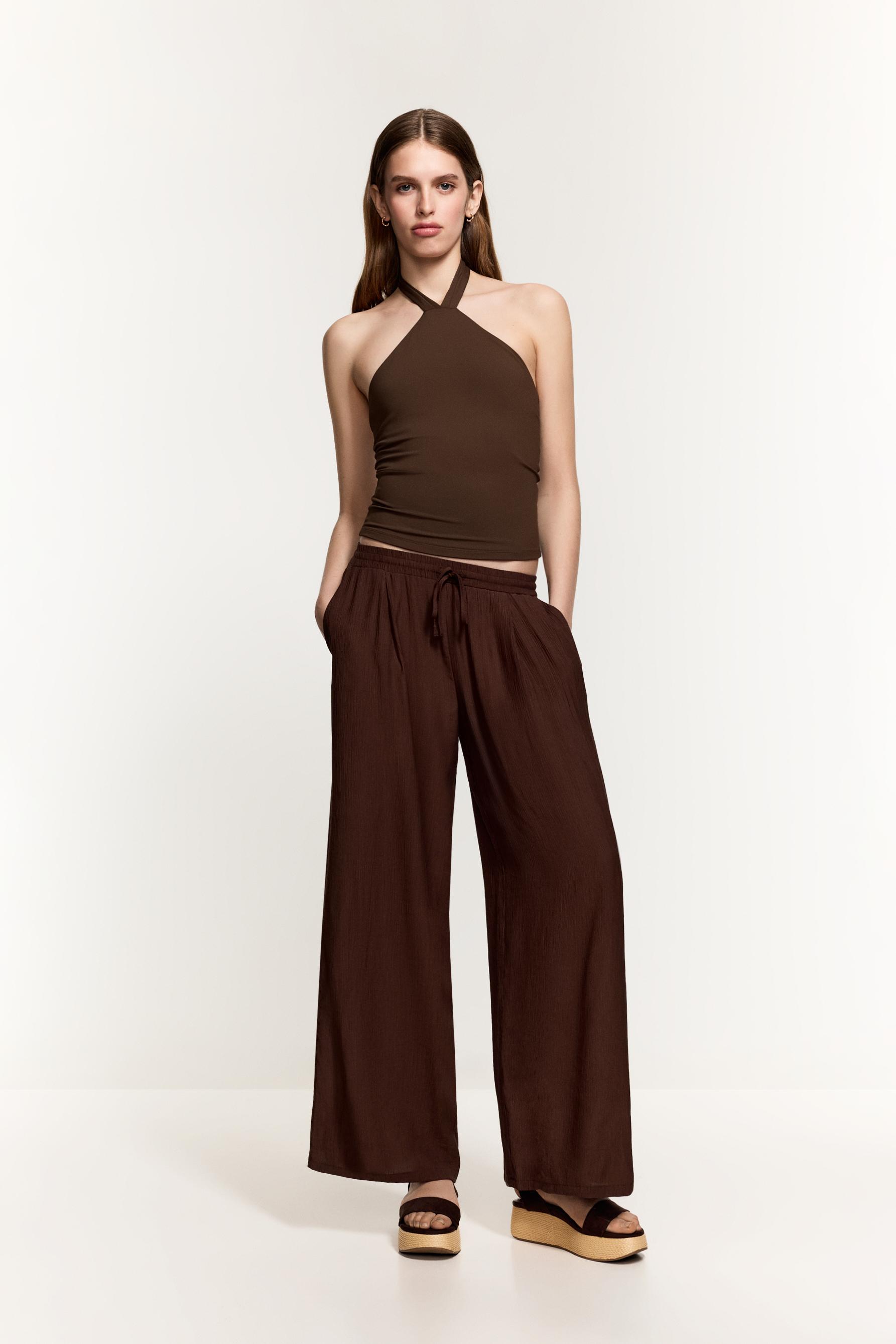 Top halter escote espalda
