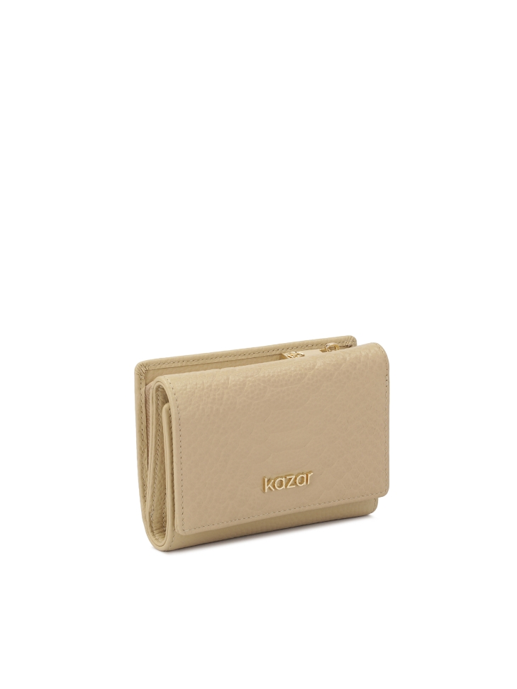 Compact beige wallet with embossed pattern