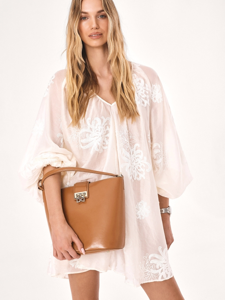 Light brown handbag with an additional pouch and handgrip