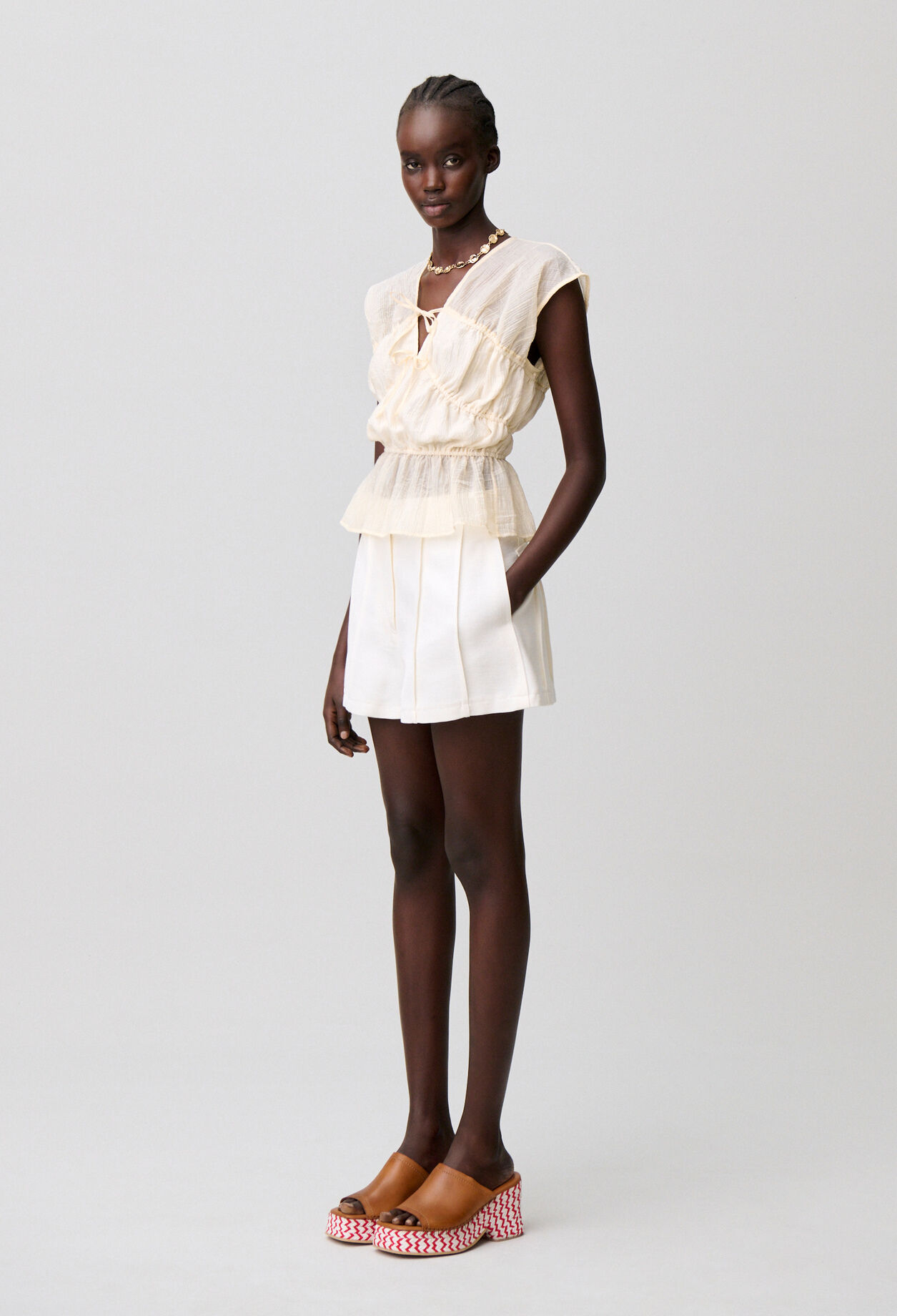 Short surpiqué couture