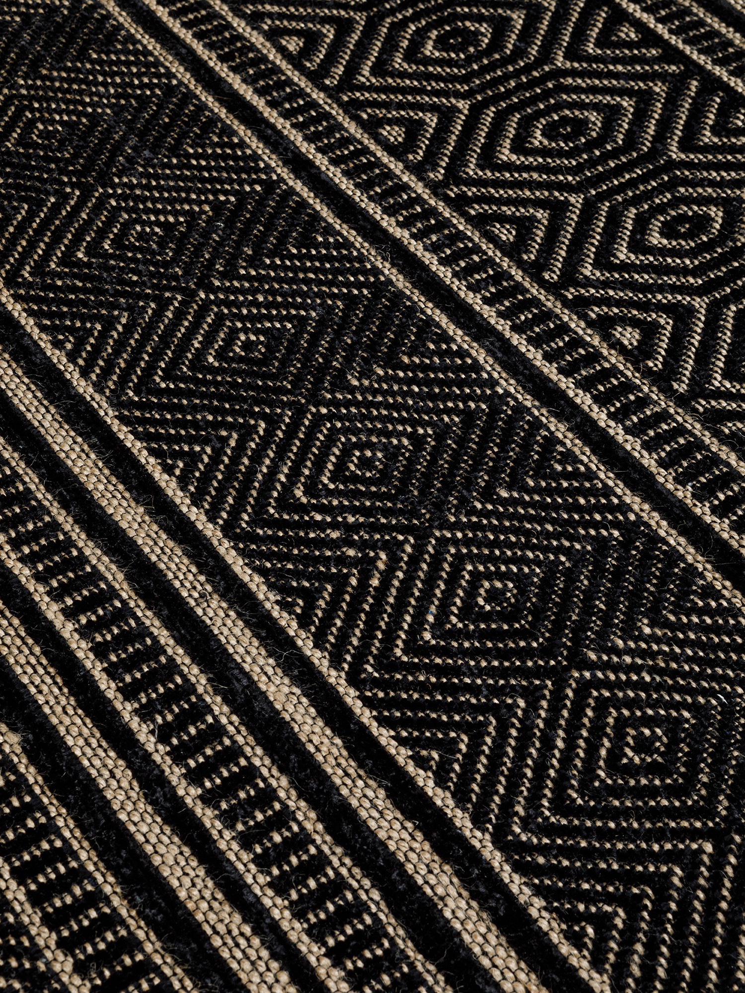 Tappeto in misto cotone motivo geometrico