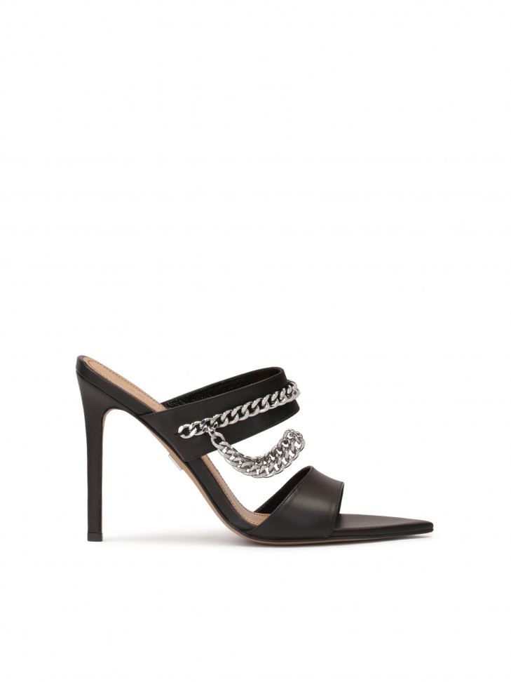 Leather heeled mules decorated with chain