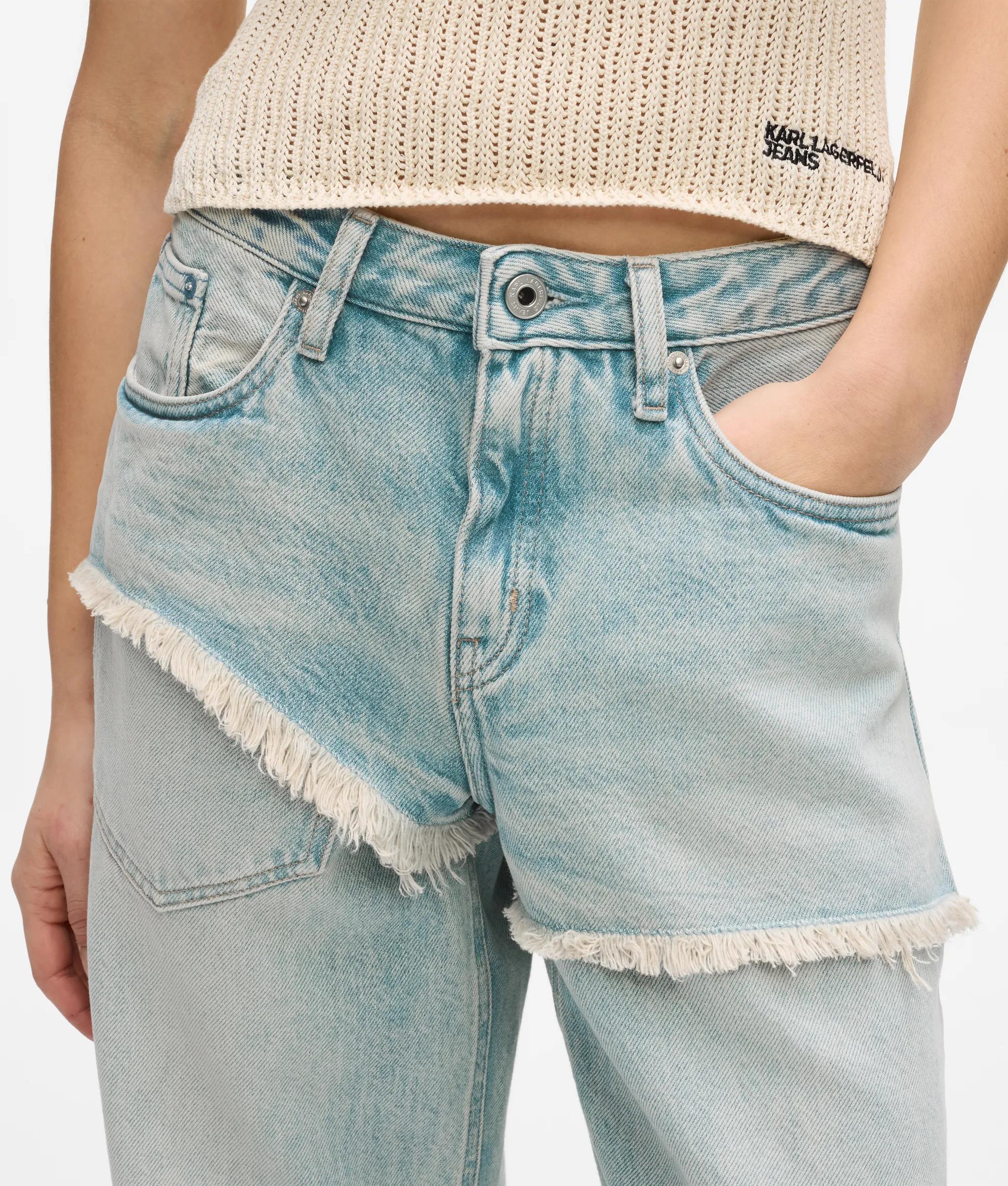 Jean décontracté taille mi-haute, ourlets effilochés