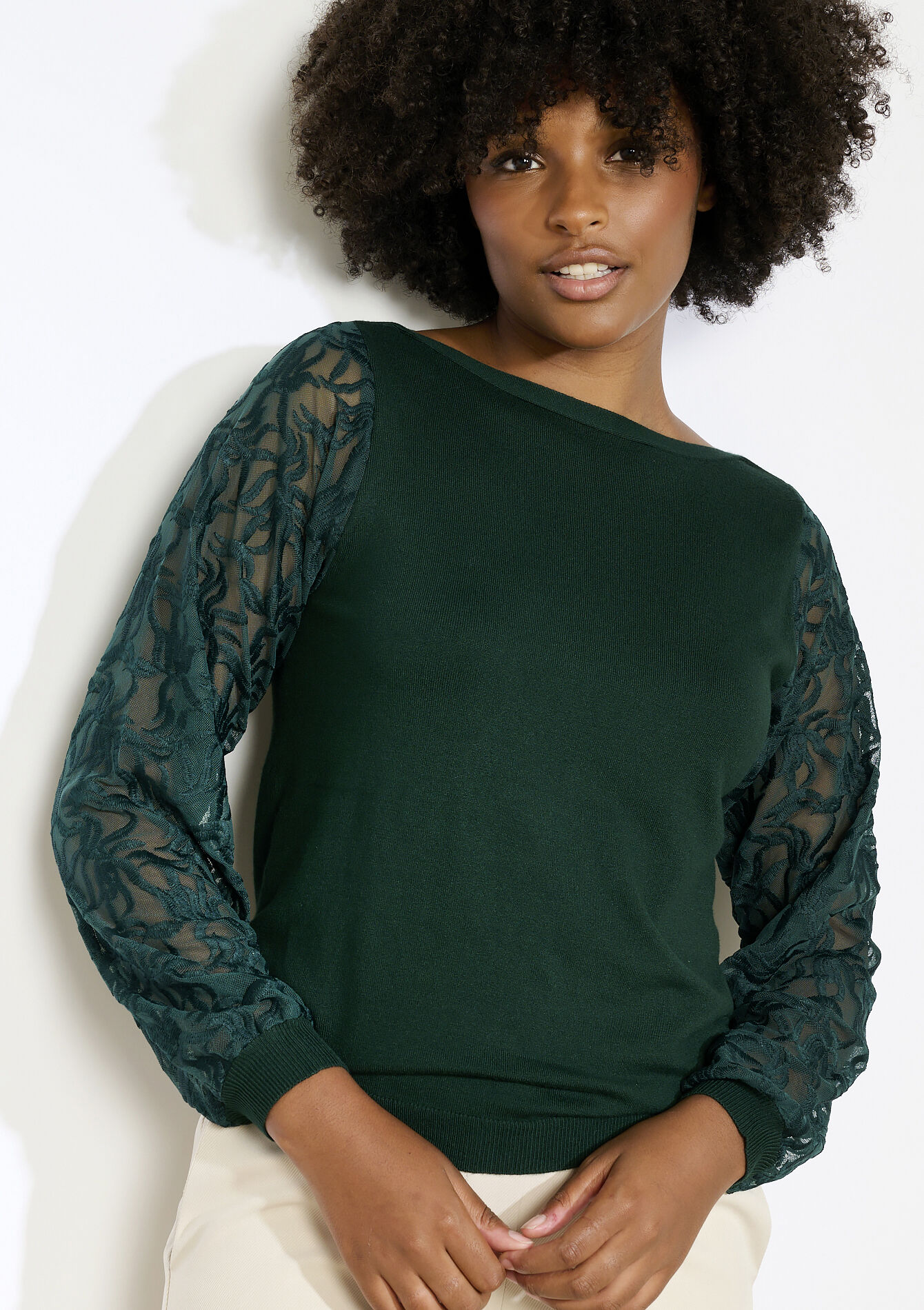 Trui met transparante mouwen