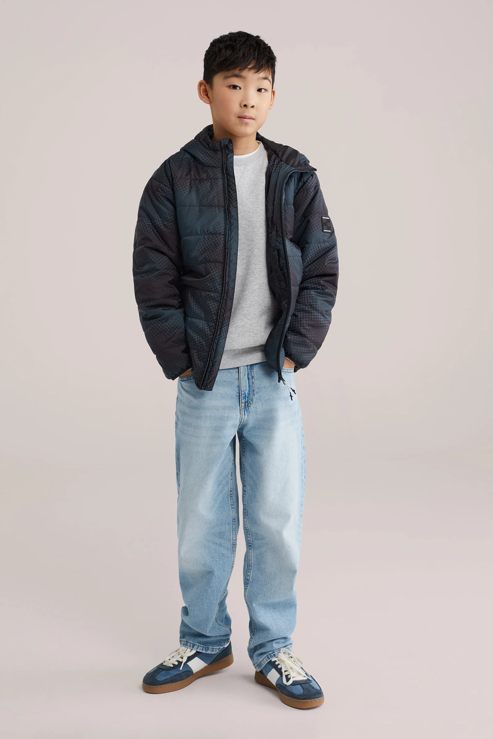 Jongens gewatteerde tussenjas met print