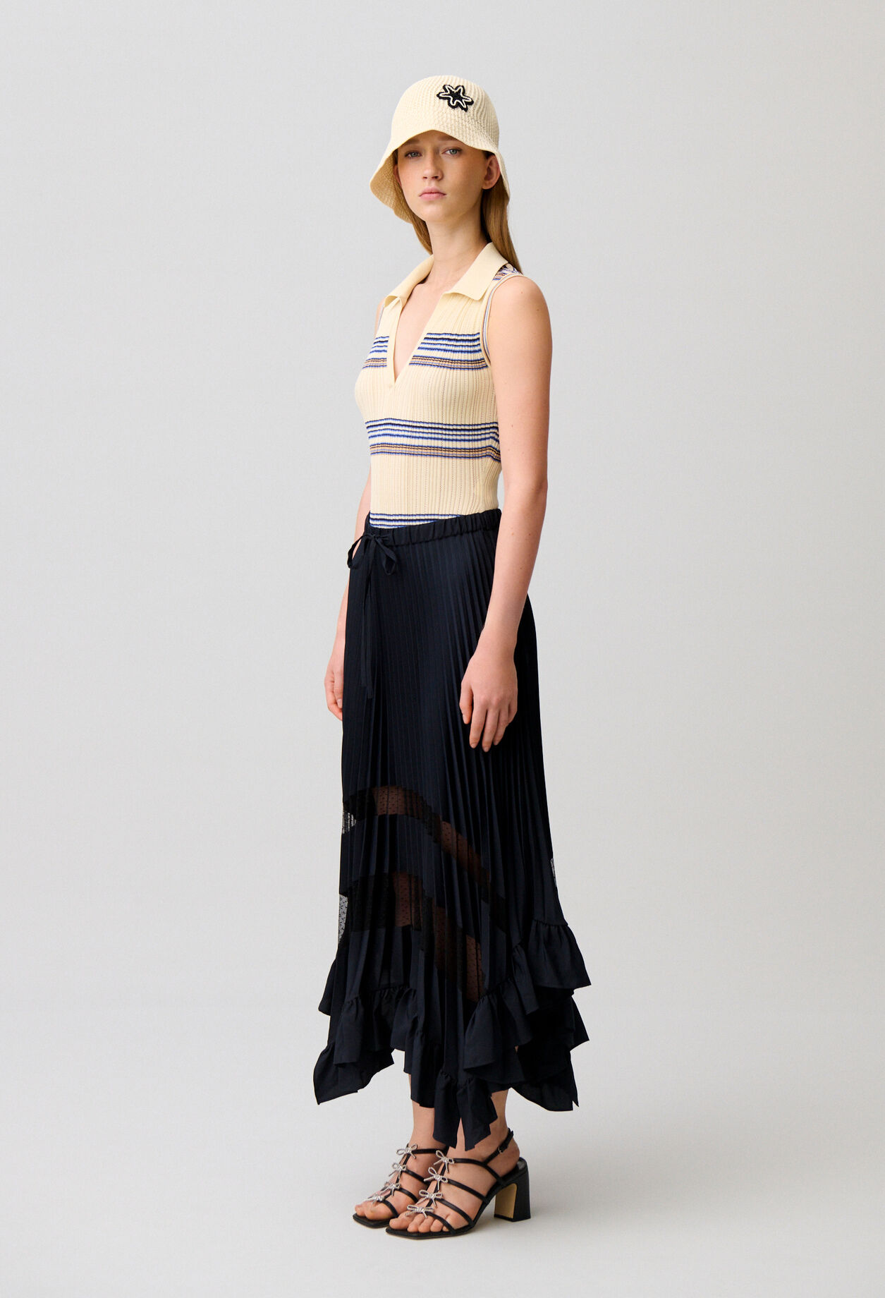 Jupe midi plissée et asymétrique