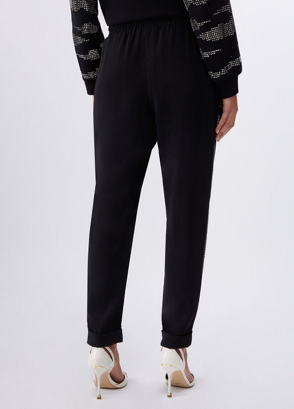 Pantaloni con strass