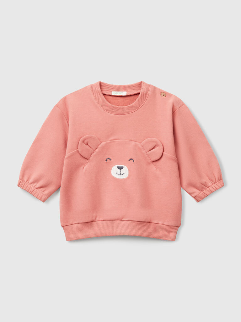 Sweatshirt with embroidery and patches